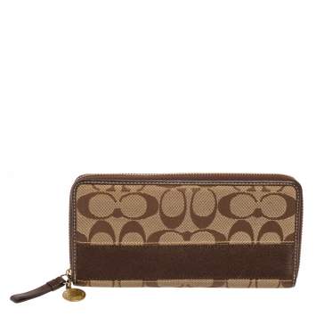 Pre Owned Coach Beige/Brown Signature Canvas Zip Around Continental Wallet