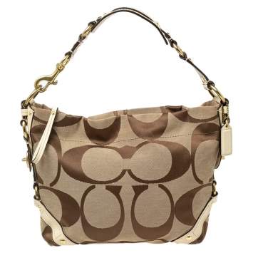 Pre Owned Coach Beige Signature Canvas and Leather Carly Hobo
