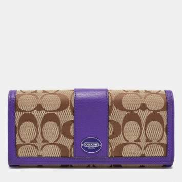 Pre Owned Coach Beige/Purple Signature Canvas and Leather Flap Continental Wallet