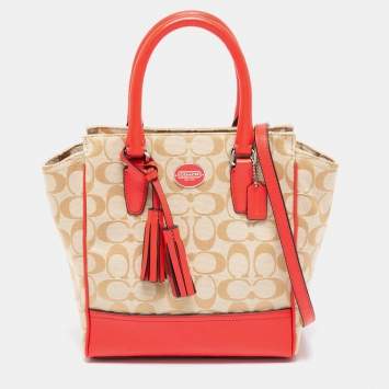 Pre Owned Coach Beige/Coral Pink Signature Canvas and Leather Tassel Tote