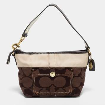 Pre Owned Coach Brown/Beige Signature Canvas Front Pocket Baguette Bag