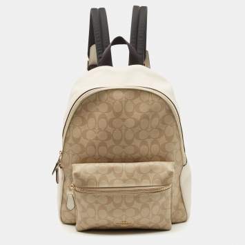 Pre Owned Coach Beige/Cream Signature Coated Canvas and Leather Charlie Backpack