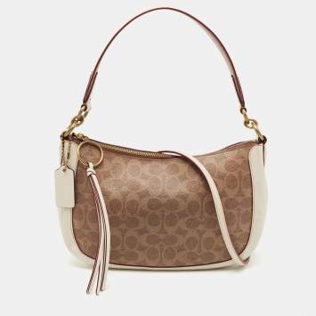 Pre Owned Coach Beige/Cream Signature Coated Canvas and Leather Sutton Hobo