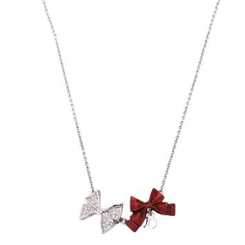 Pre Owned Dior Crystal Silver/Red Tone Textured Bow Pendant Necklace
