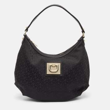 Pre Owned Dkny Black Monogram Canvas and Leather Zip Hobo