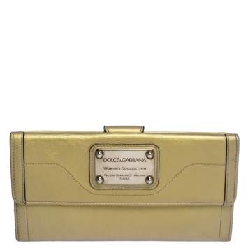 Pre Owned Dolce & Gabbana Metallic Gold Leather Logo Plaque Continental Flap Wallet