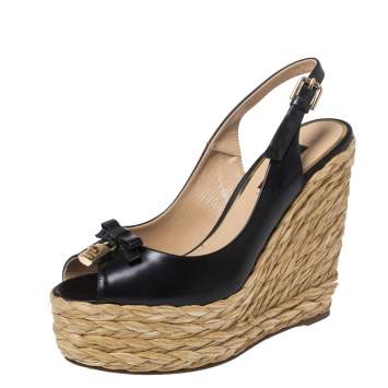 Pre Owned Dolce & Gabbana Black Leather And Raffia Lock and Bow Wedge Slingback Sandals Size 38