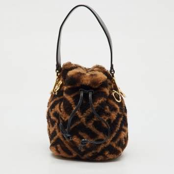 Pre Owned Fendi Brown Shearling Fur and Leather Mini Mon Tresor Drawstring Bucket Bag