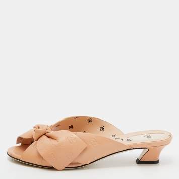 Pre Owned Fendi Beige Leather Bow FF Karligraphy Embossed Mules Size 38