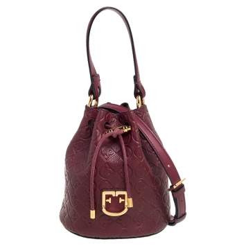 Pre Owned Furla Burgundy Embossed Leather Drawstring Corona Bucket Bag