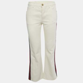 مملوكة مسبقًا بنطلون جينز غوتشي دنيم بيج مزين بشريط وِب تأثير تنويم مغناطيسي صغير مقاس خصر 28 بوصة