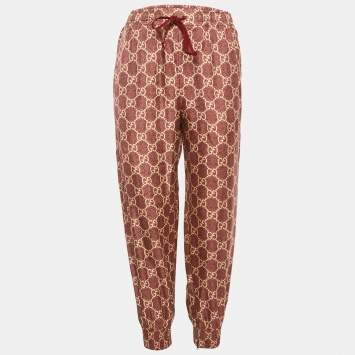 مملوكة مسبقًا Gucci Red GG Print Silk Jogger Pants M