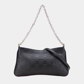 Gucci Black Medium GG Emblem Embossed Leather Shoulder Bag