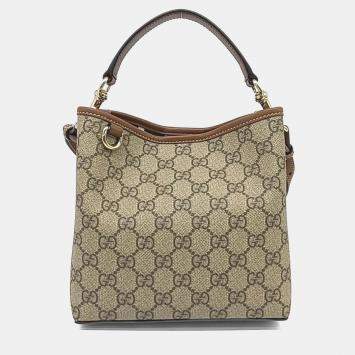 Pre Owned حقيبة دلو صغيرة قماش وجلد مطلي بيج غووتشي GG شعار