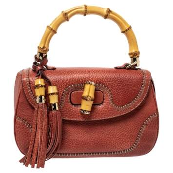Pre Owned Gucci Dark Orange Grain Leather Tassel New Bamboo Top Handle Bag