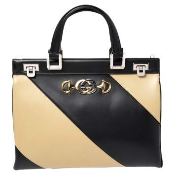 Pre Owned Gucci Black/Beige Leather Zumi Diagonal Stripe Top Handle Bag
