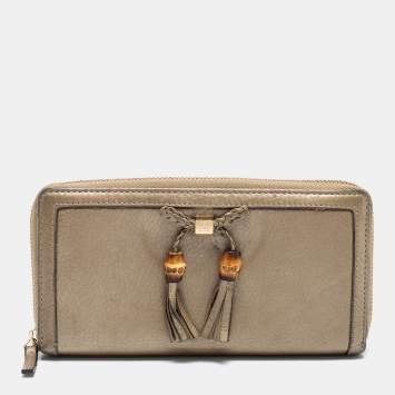 Pre Owned Gucci Gold Leather Bamboo Tassel Bow Zip Around Wallet