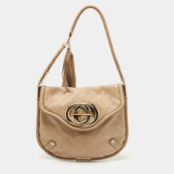 Pre Owned Gucci Beige Guccissima Leather Medium Britt Tassel Hobo