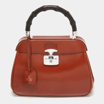 Pre Owned Gucci Brown Glossy Leather Medium Lady Lock Top Handle Bag