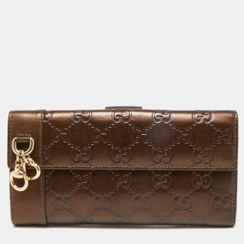 Pre Owned Gucci Bronze Guccissima Leather Charm Flap Continental Wallet