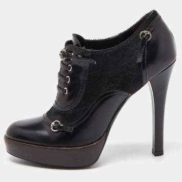 مملوكة مسبقًا Gucci Black Leather and Calf Hair Buckle Detail Platform Ankle Booties Size 38.5