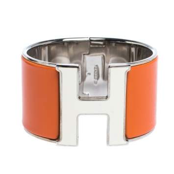 Pre Owned Hermes Clic Clac H Orange Enamel Palladium Plated Extra Wide Bracelet PM