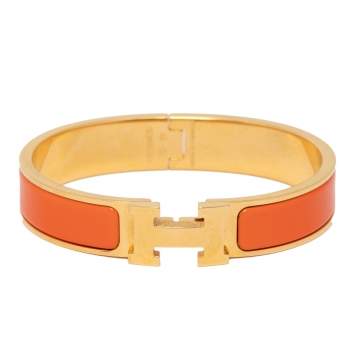 Pre Owned Hermès Clic H Orange Enamel Gold Plated Narrow Bracelet PM