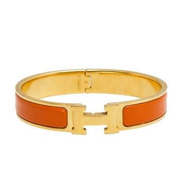 Pre Owned Hermès Clic H Orange Enamel Gold Plated Narrow Bracelet PM