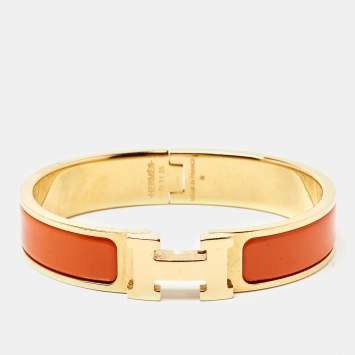Pre Owned Hermes Clic H Orange Enamel Gold Tone Bracelet