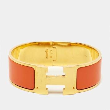 Pre Owned Hermès Clic Clac H Orange Enamel Gold Plated Wide Bracelet 