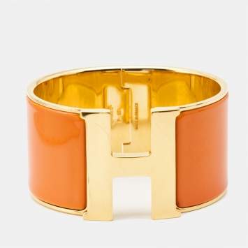 Pre Owned Hermes Clic Clac H Orange Enamel Gold Plated Extra Wide Bracelet