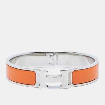 Pre Owned Hermes Clic  H Orange Enamel Palladium Plated Narrow Bracelet 