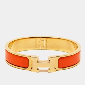 Pre Owned Hermes Clic H Orange Enamel Gold Plated Bracelet