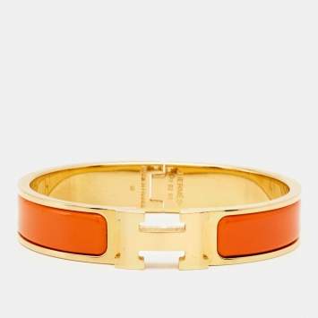 Pre Owned Hermes Clic H Orange Enamel Gold Plated Bracelet
