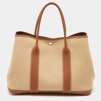Pre Owned Hermes Trench/Gold Toile H and Negonda Leather Garden Party 36 Bag
