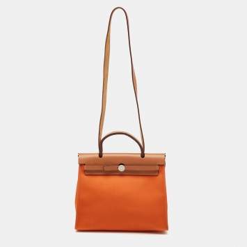Pre Owned Hermès Orange/Natural Canvas and Vache Hunter Leather Herbag Zip 31 Bag
