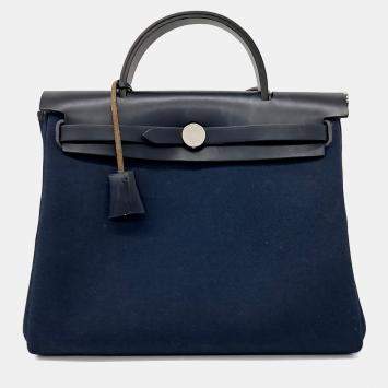 مملوكة مسبقًا حقيبة هيرمس هيرباغ جديدة سحاب قماش أسود وجلد حجم صغير