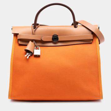 Pre Owned Hermes Brown Orange Toile Herbag Zip 31