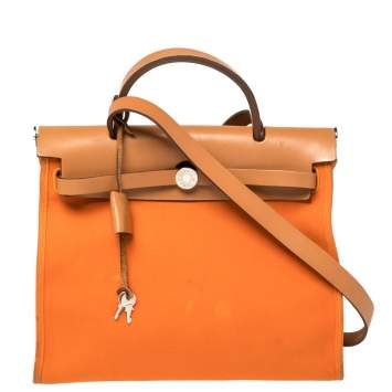Pre Owned Hermes Orange/Natural Canvas and Leather Herbag Zip 31 Bag