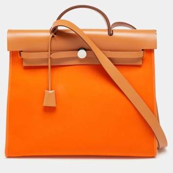 Pre Owned Hermés Orange/Natural Canvas and Leather Herbag Zip 39 Bag