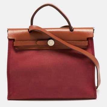 Pre Owned Hermes Ruby/Fauve Canvas and Leather Herbag Zip 31 Bag