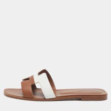 Pre Owned Hermes Brown/White Leather Oran Flat Slide Sandals Size 41