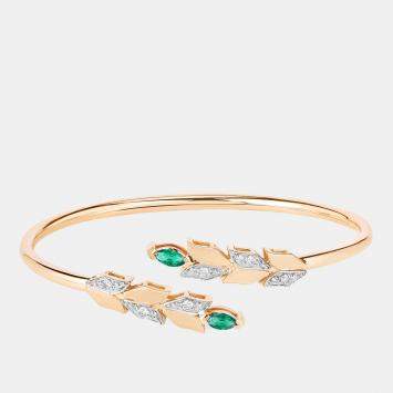 مملوكة مسبقًا 0.50 cts Emerald and Diamond 14K Yellow Gold Bypass Bangle