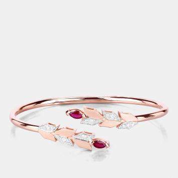 مملوكة مسبقًا 0.80 cts Ruby and Diamond 14K Rose Gold Bypass Bangle