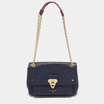 Pre Owned Louis Vuitton Navy Blue Monogram Empreinte Leather Vavin PM Bag