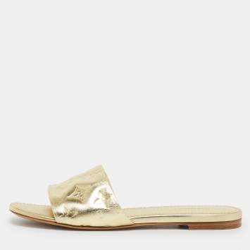 Pre Owned Louis Vuitton Gold Monogram Embossed Leather Revival Flat Slides Size 37.5