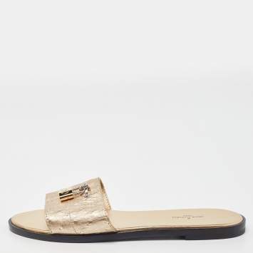 Pre Owned Louis Vuitton Gold Ostrich Leather Lock It Flat Sandals Size 38