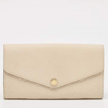 Pre Owned Louis Vuitton Tourterelle Monogram Empreinte Leather Sarah Wallet
