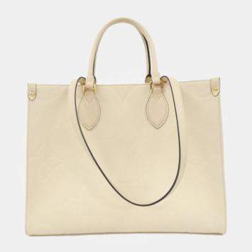 Pre Owned Louis Vuitton Cream Monogram Empreinte Leather OnTheGo MM Handbag