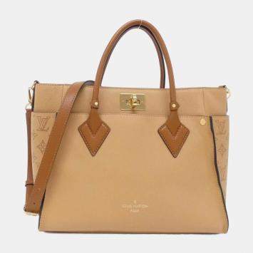 Pre Owned Louis Vuitton Leather Mahina On My Side MM Handbag